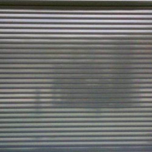 Cierre de cristal con perfilería de aluminio